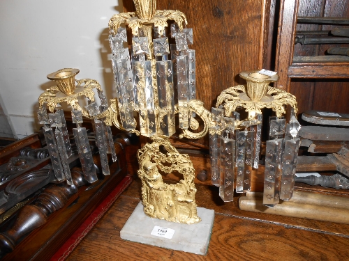 Gilt brass and glass three branch candelabra