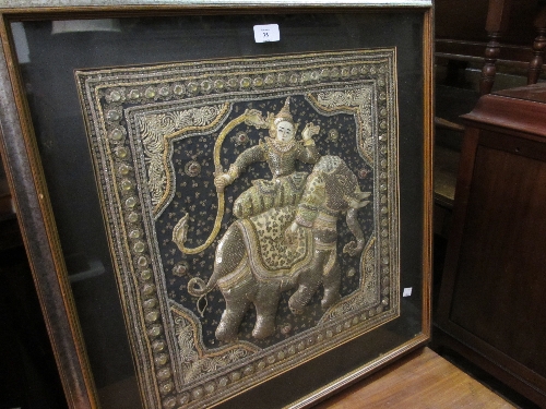 Eastern gold and silver thread work panel depicting a figure on an elephant