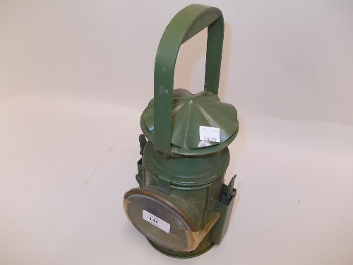 Green metal military issue oil lamp