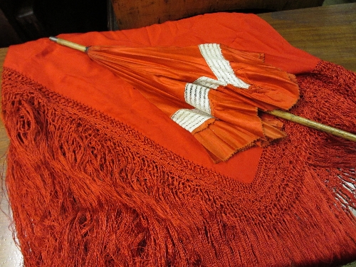 Edwardian ladies red satin parasol and a red crepe shawl