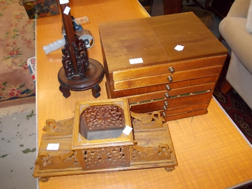 Carved Chinese lamp stand, pierced desk stand and a home made coin collectors cabinet