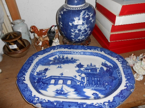 Large 19th Century Chinese blue and white ginger jar and cover decorated with prunus blossom on a