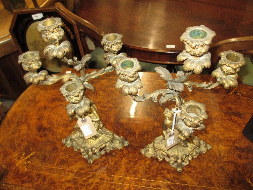 Pair of 19th Century French ormolu figural four branch candelabra