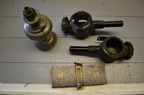 Pair of black painted coaching lamps, an oil lamp base and a flower press