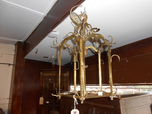 Late 19th / early 20th Century gilt brass hexagonal hanging lantern with cut glass drops and clear