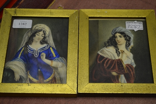 Pair of small continental watercolour portraits of a lady holding a dagger and another lady in a