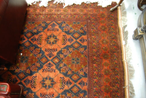 Modern Afghan Belouch rug with geometric design on dark ground