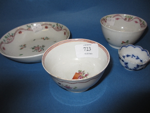 18th Century English tea bowl and saucer decorated with floral sprigs, another similar tea bowl