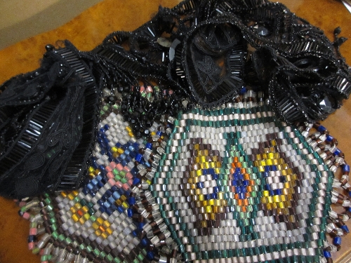 Two glass beadwork teapot mats and a black lace and bead work 1930`s shoulder piece (a/f)