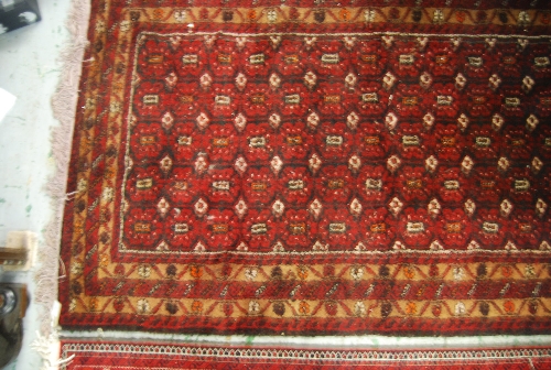 Modern Afghan Belouch rug with geometric design on dark ground