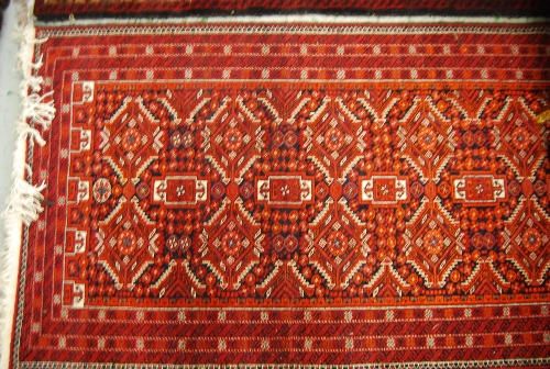 Good quality modern Beshir type rug with all-over design on a dark ground with borders