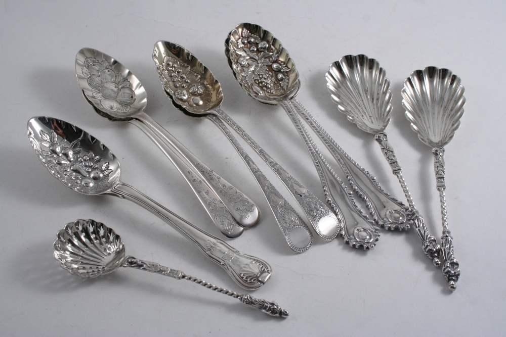 A MIXED LOT: Two pairs of later-decorated or "Berry" table spoons, two pairs of fruit serving