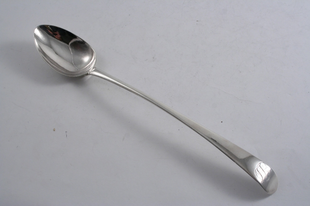 A GEORGE III OLD ENGLISH PATTERN BASTING SPOON initialled by Hester Bateman, London 1788; 11.8" (