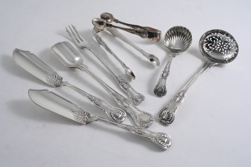 ASSORTED KING`S PATTERN: A Victorian sugar sifter ladle, two pairs of sugar tongs, a pickle fork,
