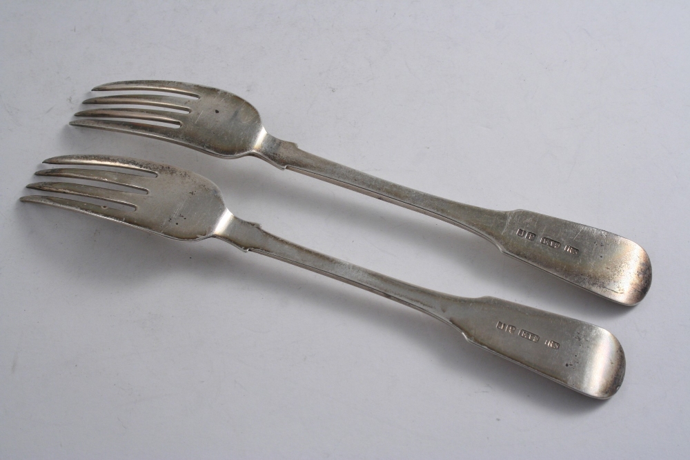 A PAIR OF SCOTTISH PROVINCIAL FIDDLE PATTERN TABLE FORKS initialled "C", by J. Pozzi & R. Stewart,