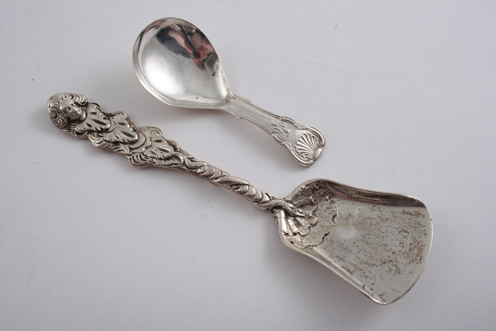 A GEORGE III SCOOP with a shovel bowl & a cast decorative stem, wound with a serpent & terminating