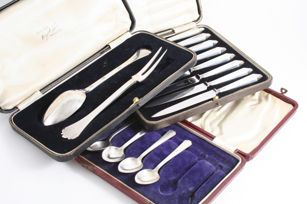 A MODERN CASED TREFID SERVING SPOON & TWO-PRONG FORK initialled "W", by T. Bradbury & Sons, London