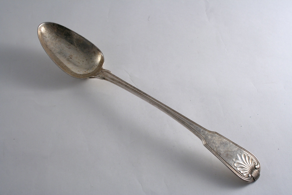 A GEORGE III FIDDLE, THREAD & SHELL PATTERN BASTING SPOON by Soloman Hougham, London 1805; 12.25" (