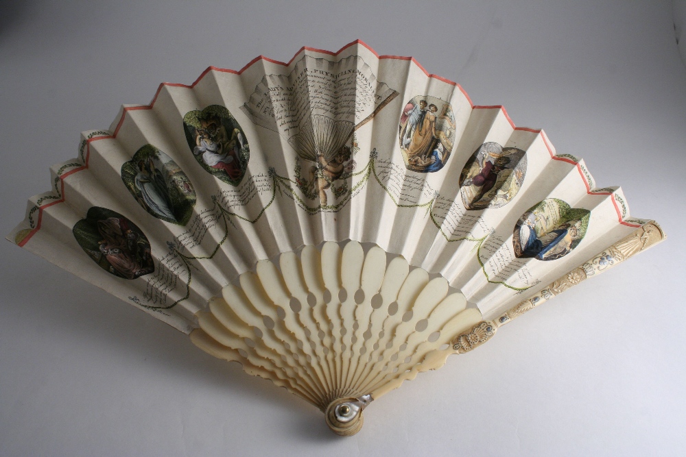 A GEORGE III FAN The ivory guards with silver pique, paper leaves printed with vignettes `The Lady`s