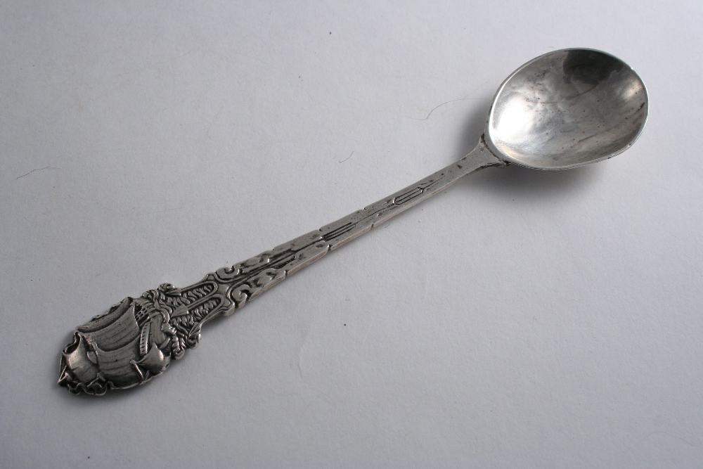 BY RAMSDEN & CARR: A modern handmade spoon with a trident stem and a galleon terminal, London