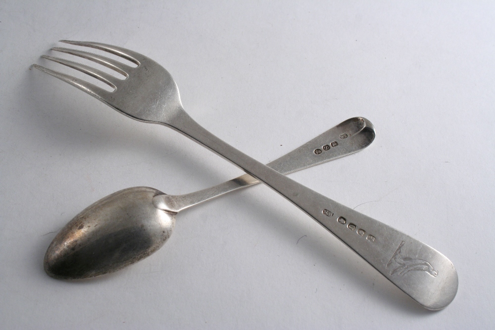 BY PAUL STORR: An Old English pattern table fork, crested, London 1815 and a tea spoon, crested,