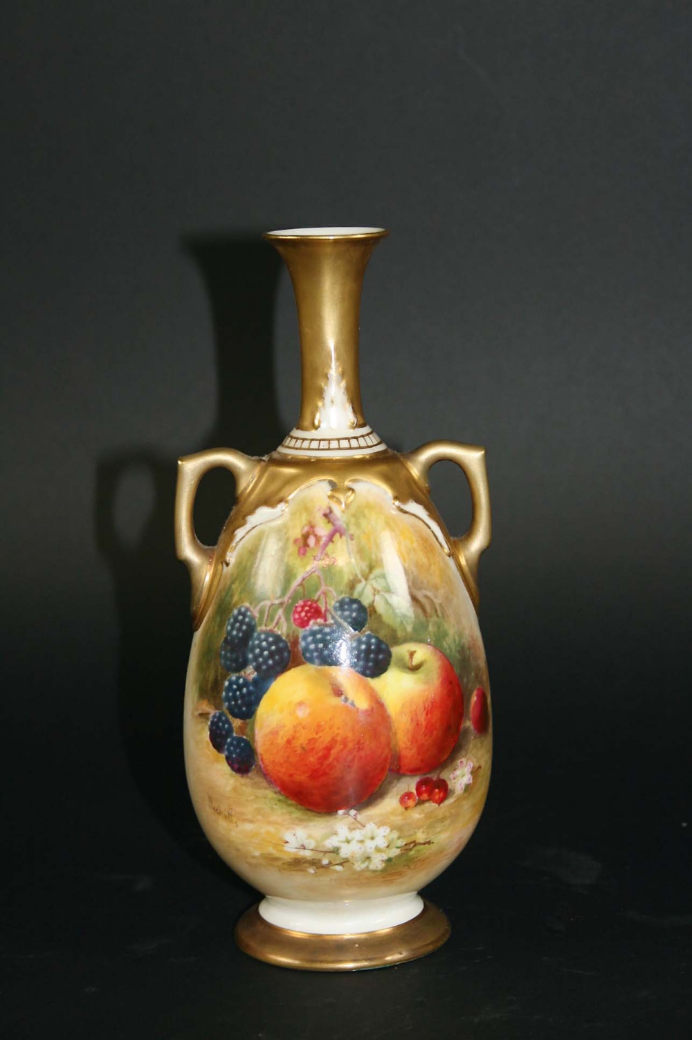 ROYAL WORCESTER VASE - SIGNED the vase painted with various fruit, and gilded handles, base and