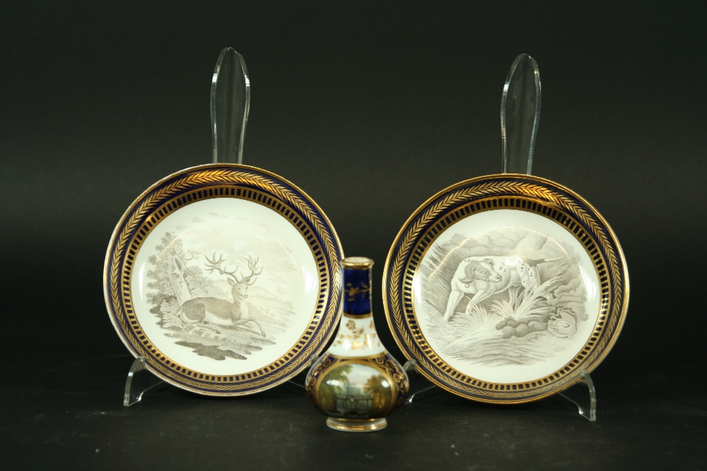 A PAIR OF SPODE SAUCERS one printed with a deer, the other a pointer, iron red mark and no. 1485,