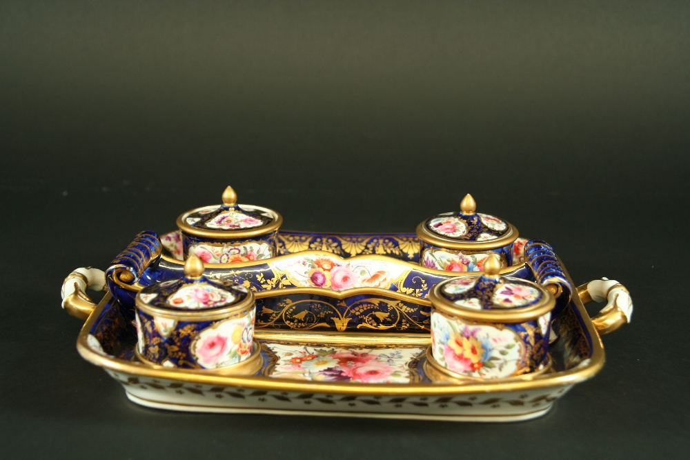 A DAVENPORT PARTNERS INKSTAND with four lidded receivers and a lift-off pen tray, each piece