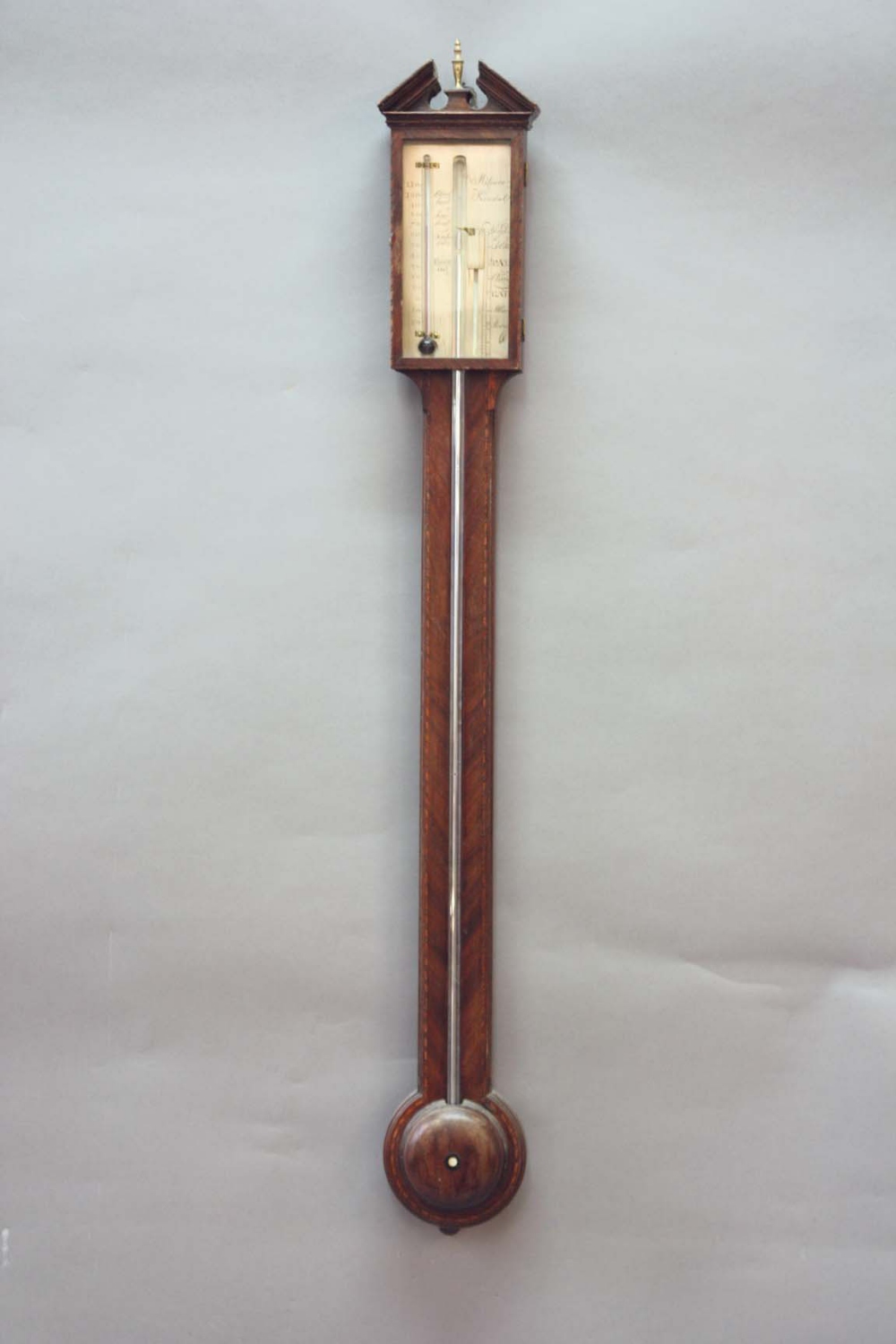 A MAHOGANY STICK BAROMETER the silvered register plate signed De Milesio, Kendal, alcohol