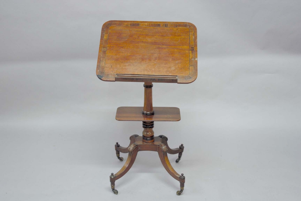 A GEORGE IV MAHOGANY OCCASIONAL TABLE the rounded rectangular top with broad rosewood