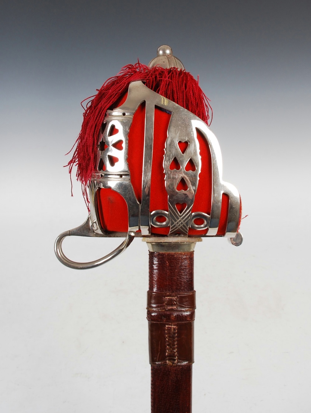 A George V basket hilted Officers broadsword of the Argyll and Sutherland Highlanders by Wilkinson