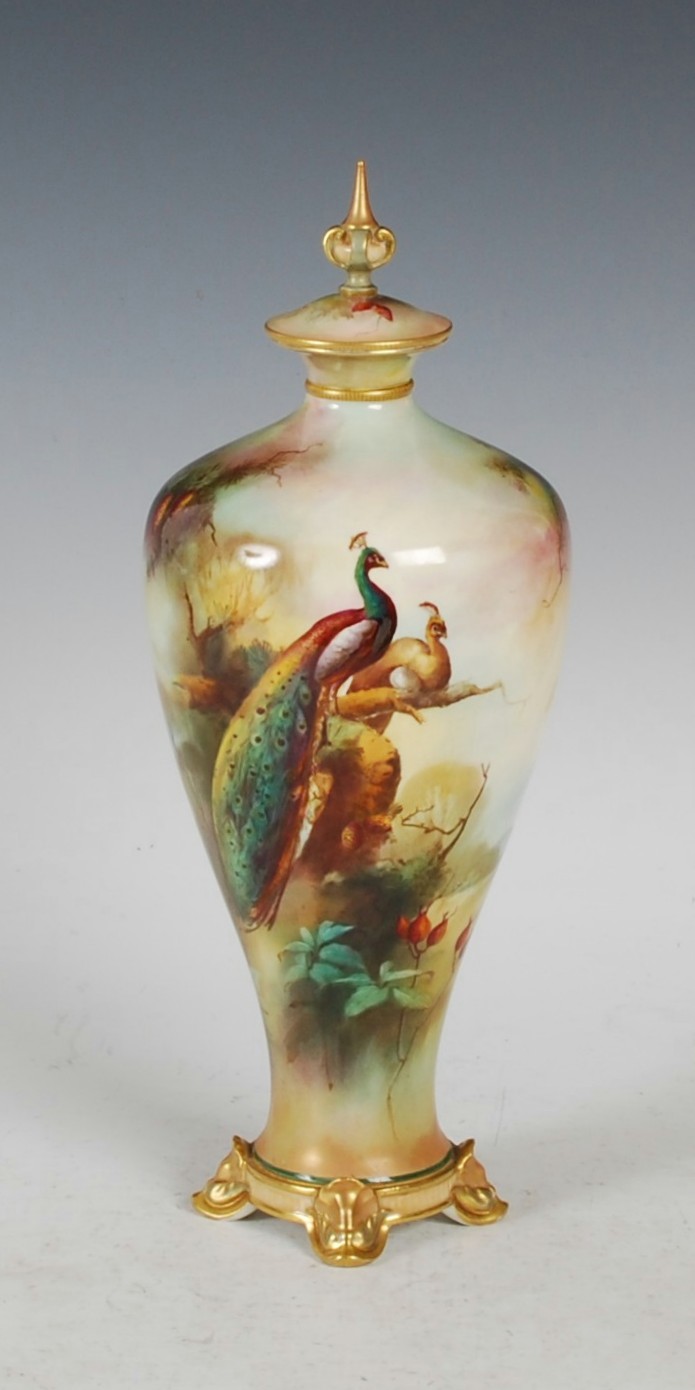 A Royal Worcester hand painted vase and cover signed W.E. JARMAN, dated circa 1906, decorated with