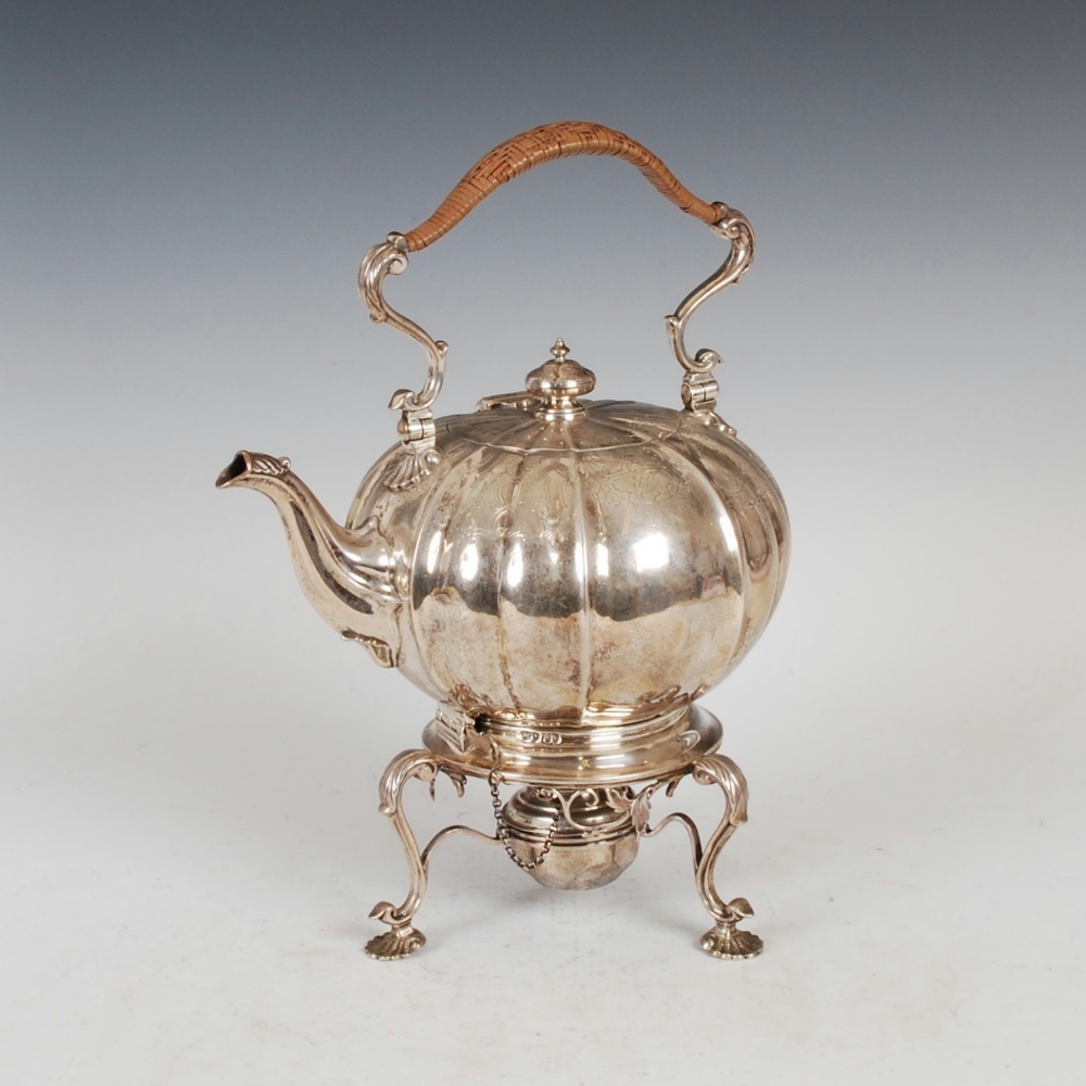 A Victorian silver tea kettle on stand, London, 1846, makers mark WM, of fluted melon shape with