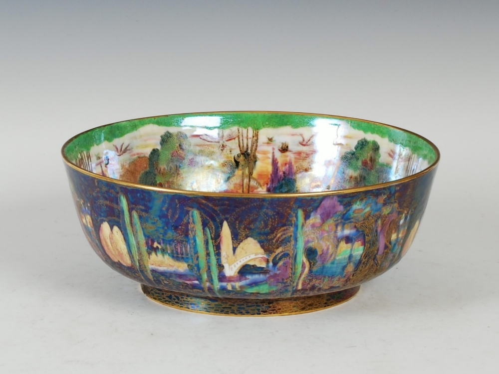 A Wedgwood Fairyland lustre bowl designed by Daisey Makeig-Jones, decorated with the Woodland Bridge