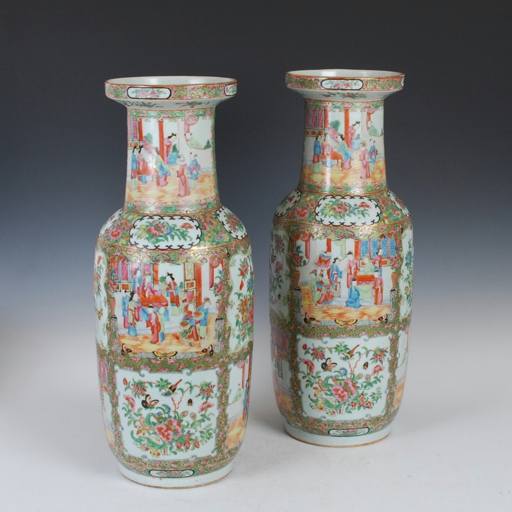 A large pair of Chinese porcelain famille rose Canton rouleau-shaped vases, Qing Dynasty,