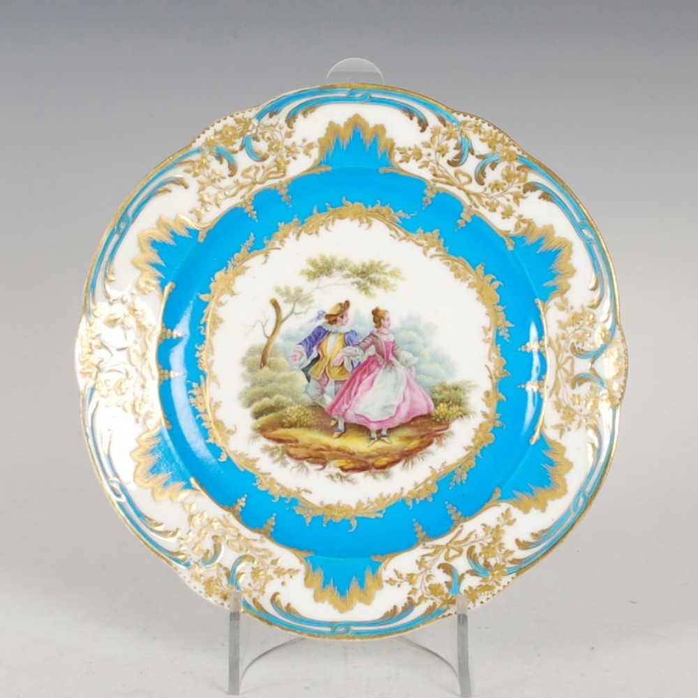 A Sevres porcelain bleu celeste ground cabinet plate, decorated with Court figures in a garden