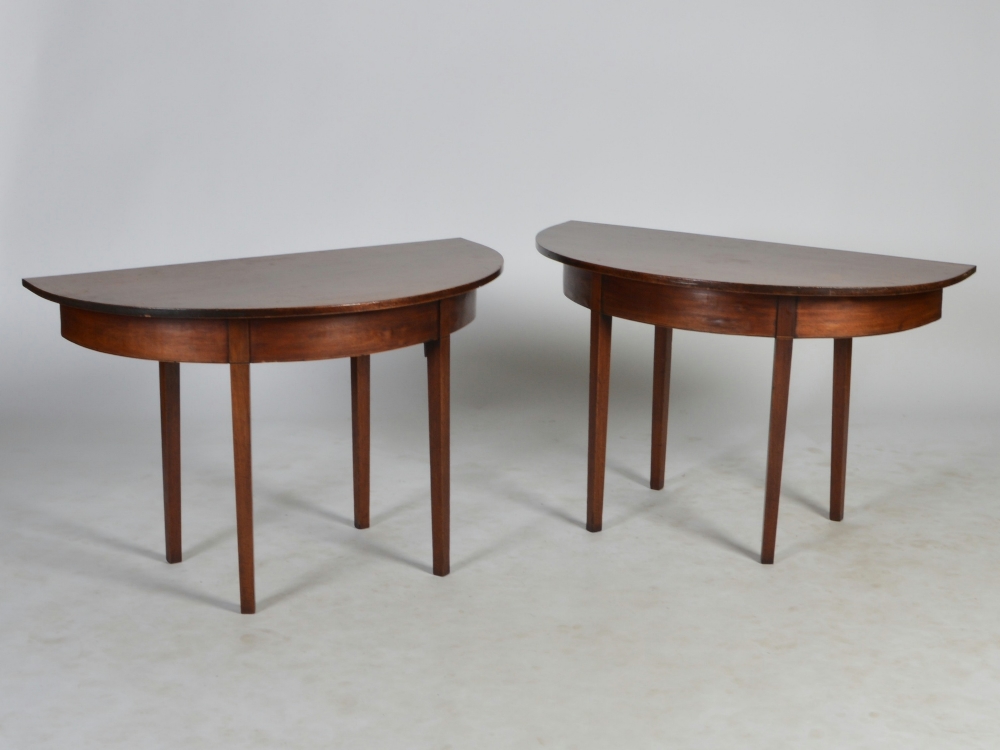 A pair of 19th century mahogany D-end tables, raised on four tapered square supports, 115cm wide x