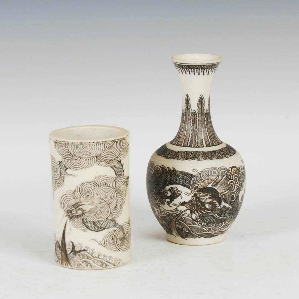 A Chinese bisque porcelain brush pot and a similar bottle-shaped vase, bearing six character