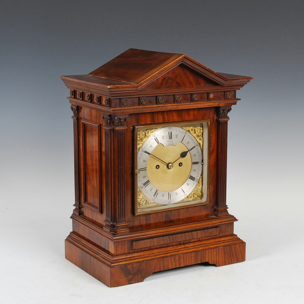 A late 19th/ early 20th century walnut cased bracket clock DENT, LONDON, the 6 1/2 " square brass