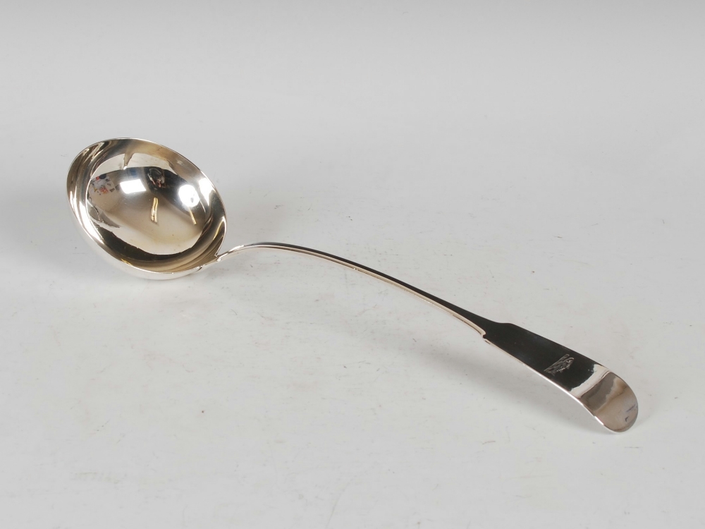 A George III Irish silver ladle, Dublin, 1811, makers mark of SN, fiddle pattern with rat tail,