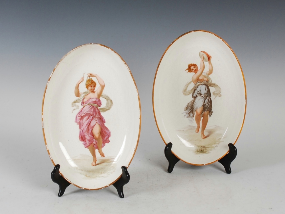 A pair of Continental pottery oval-shaped dishes named `Le Tambour de Basque` and `Le Triangle`,