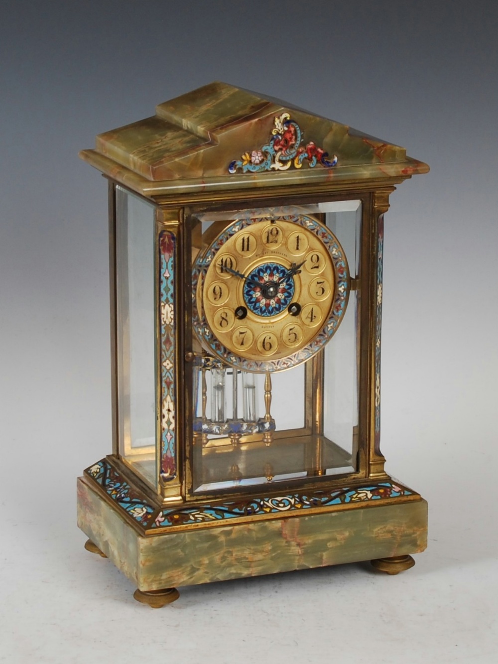 A late 19th century French champleve enamel and onyx mantle clock MACKAY BROTHERS, DUNDEE, the 4 1/