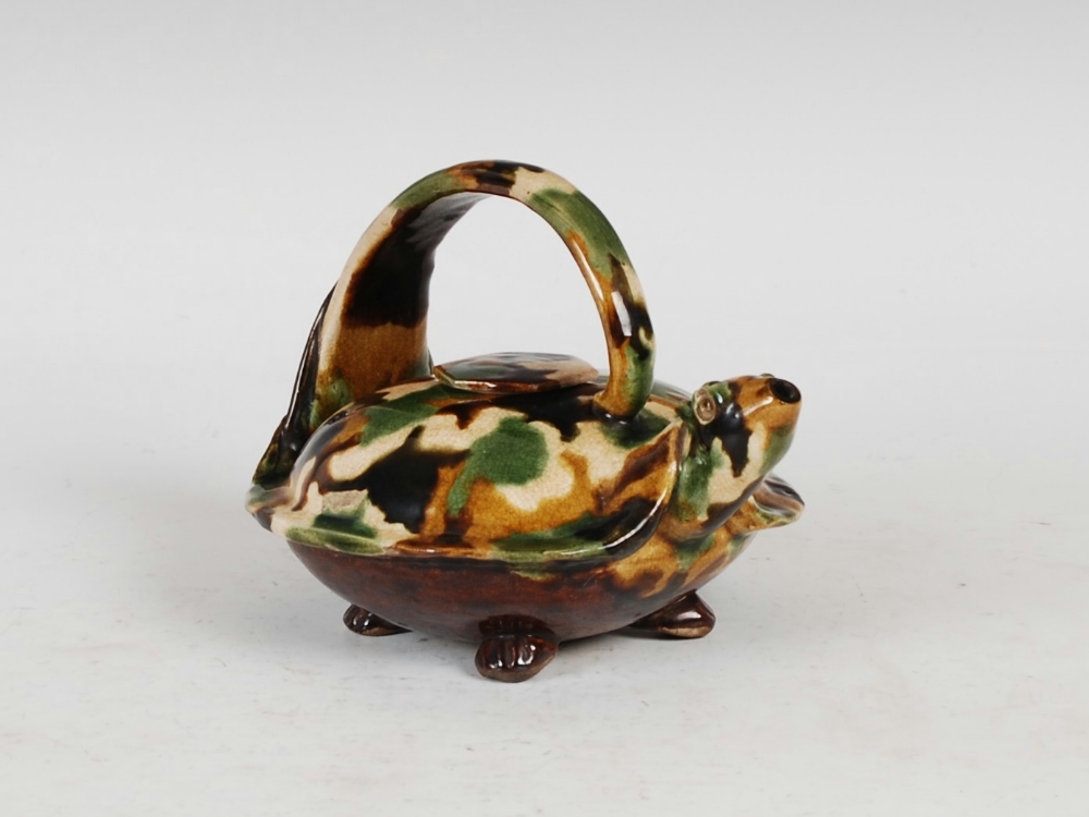 A Chinese stoneware terrapin form teapot and cover, decorated with an egg and spinach glaze, 15.