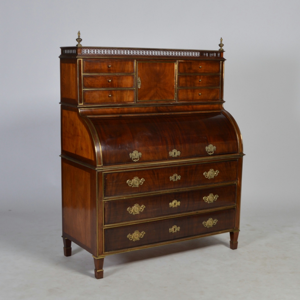 A 19th century Continental mahogany and gilt metal mounted cylinder desk, the upright back with