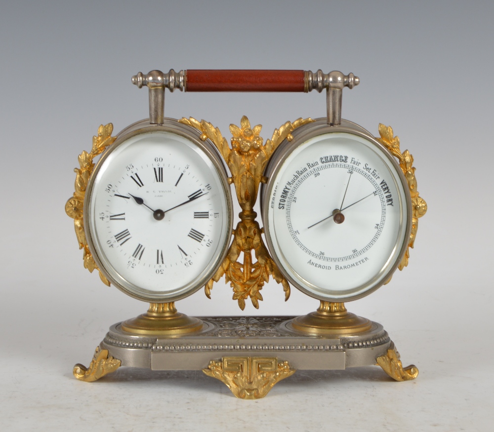 A late 19th/ early 20th century French silvered and gilt bornze desk timepiece W. G. Taylor Paris,