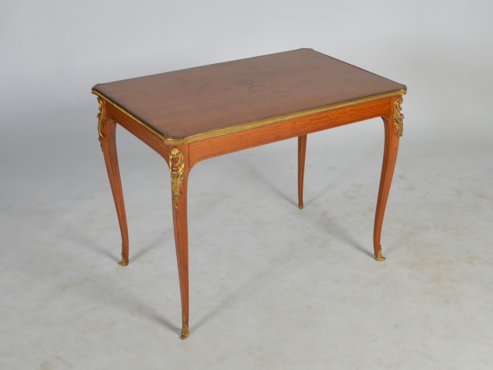 An early 20th century satinwood, gilt metal mounted and marquetry centre table, the rectangular