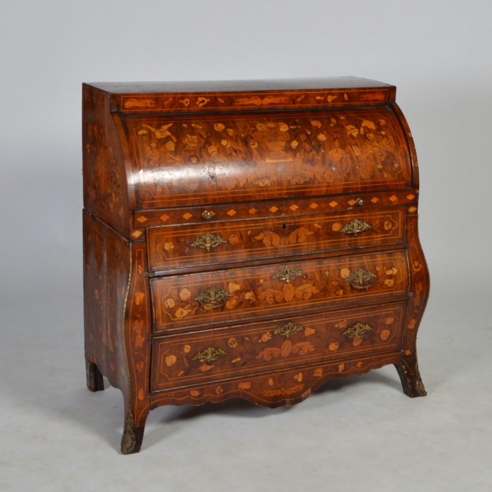 A 19th century Continental mahogany, marquetry and gilt metal mounted cylinder bureau, the