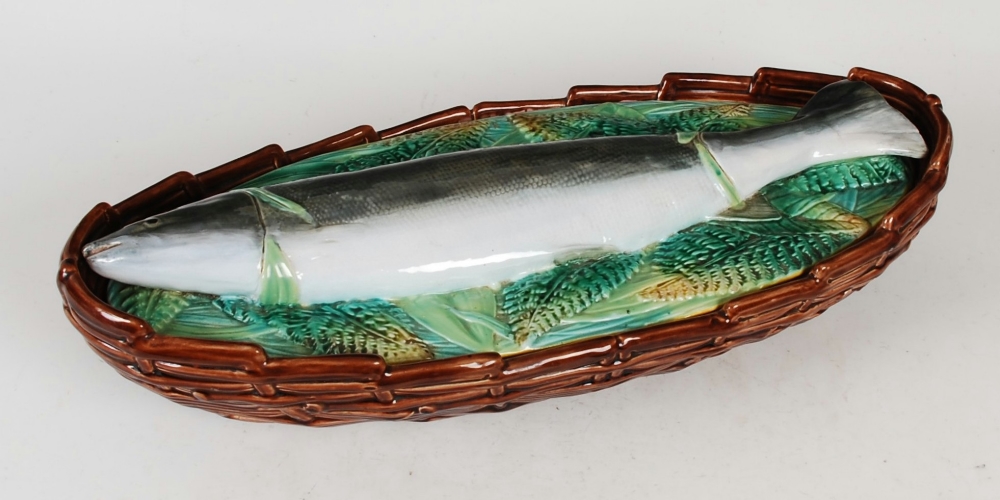 A Victorian George Jones majolica fish serving dish and cover, the cover moulded with a salmon lying