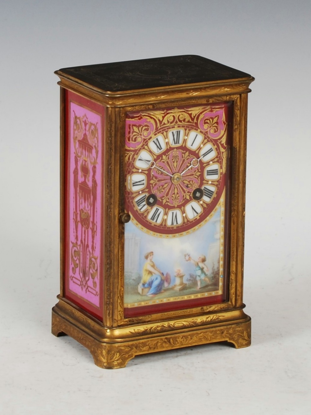 A 19th century Continental porcelain mounted gilt metal mantle clock, the dial with painted Roman