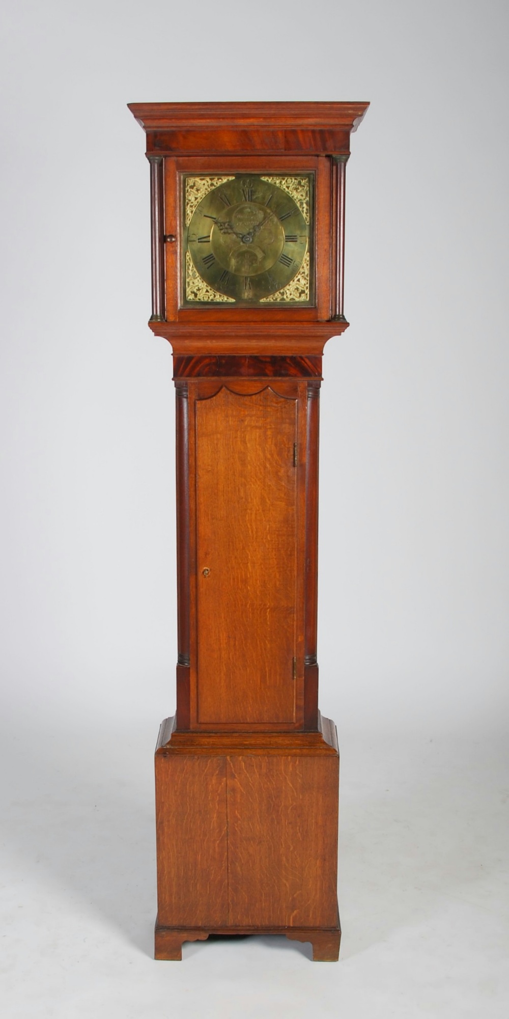 A late 18th/ early 19th century oak longcase clock, Wilkinson, Penrith, the 11¼" square brass dial